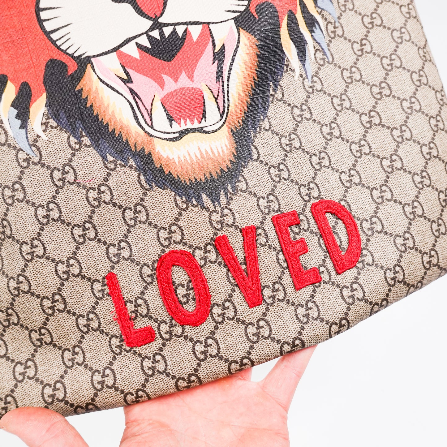 Gucci GG Supreme Angry Cat Drawstring Bag