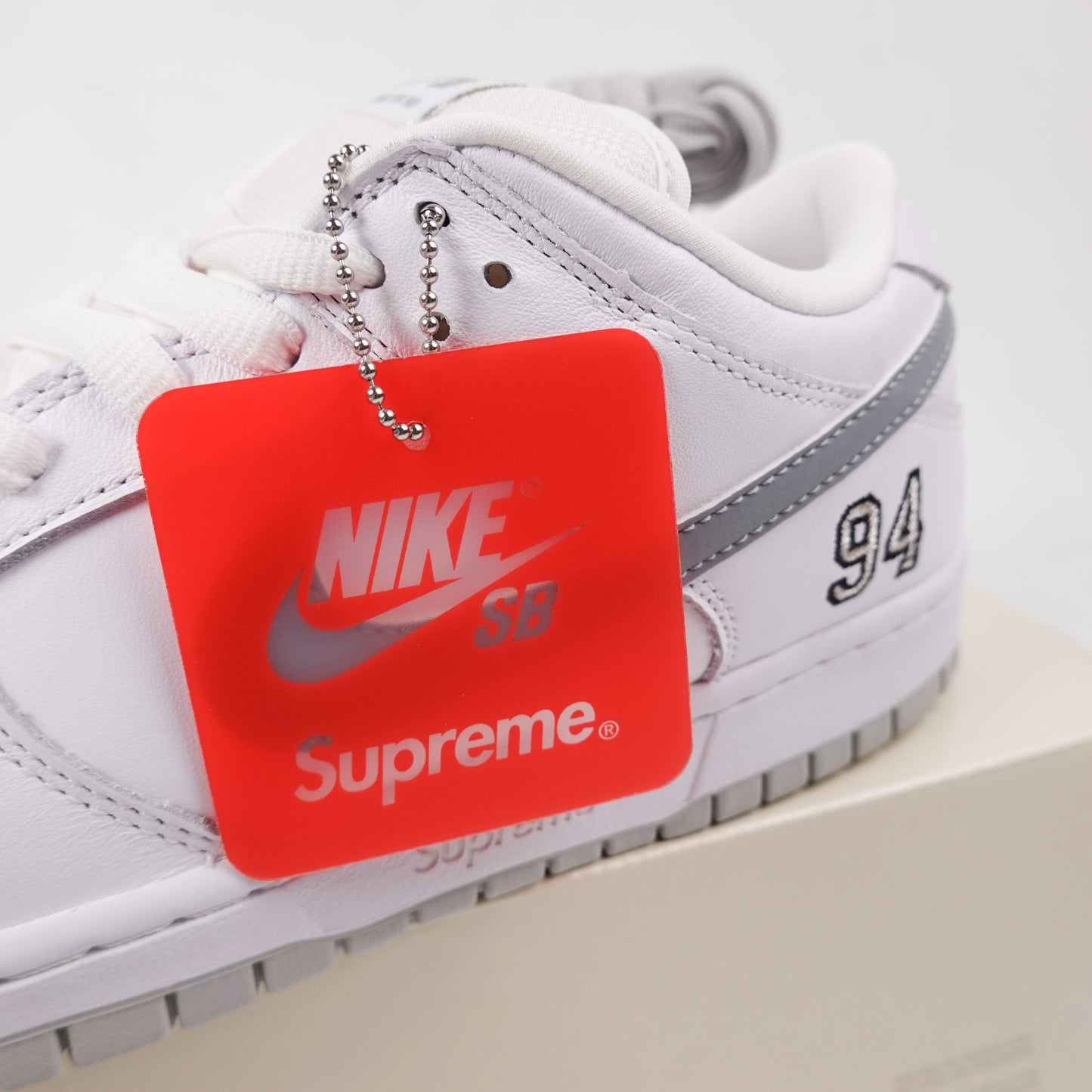 Supreme Nike SB Dunk Low White Metallic - Size 10