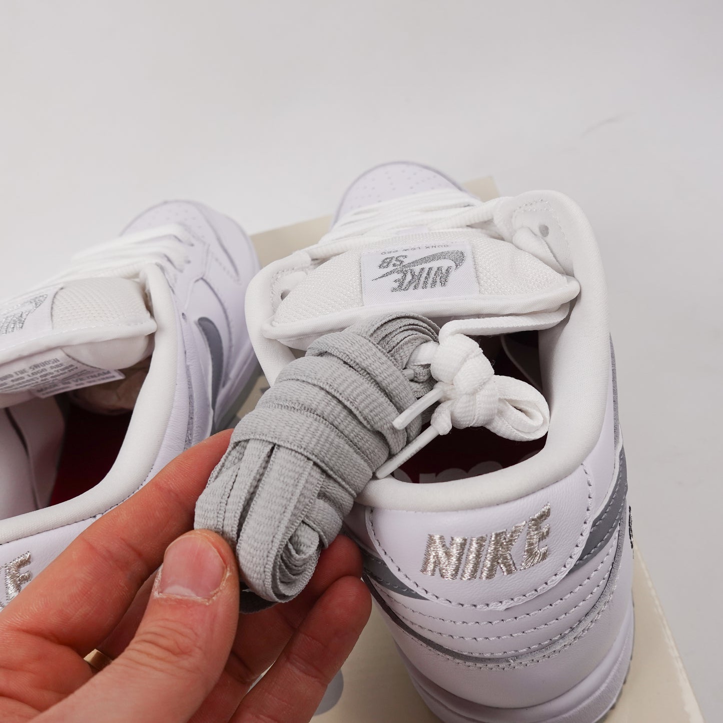 Supreme Nike SB Dunk Low White Metallic - Size 10