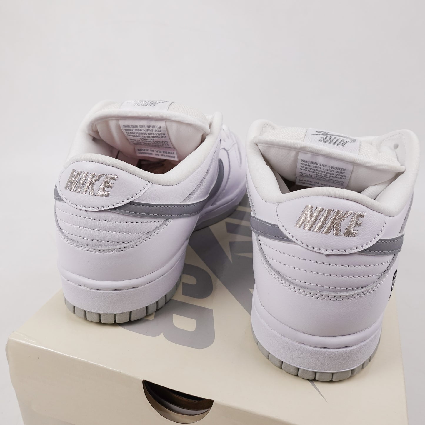 Supreme Nike SB Dunk Low White Metallic - Size 10