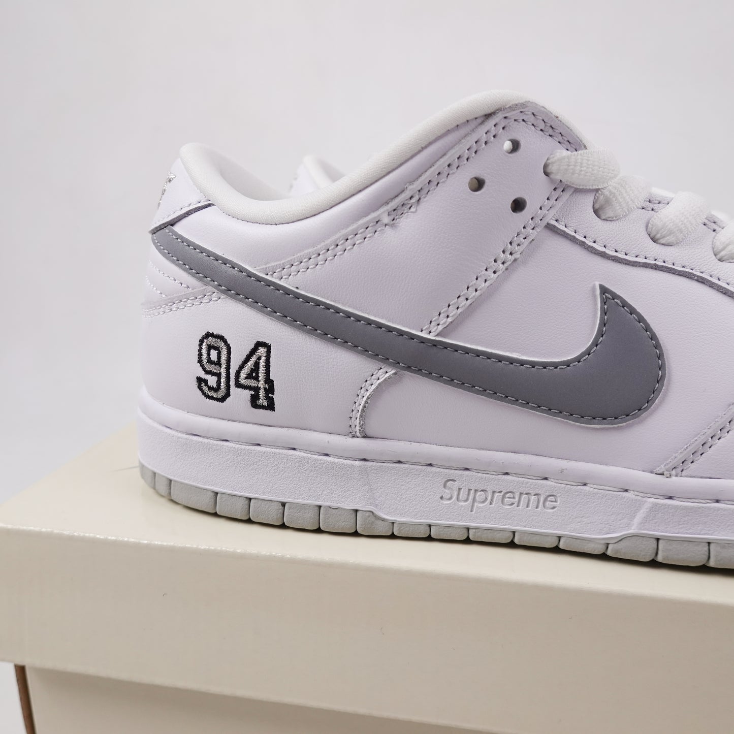 Supreme Nike SB Dunk Low White Metallic - Size 10