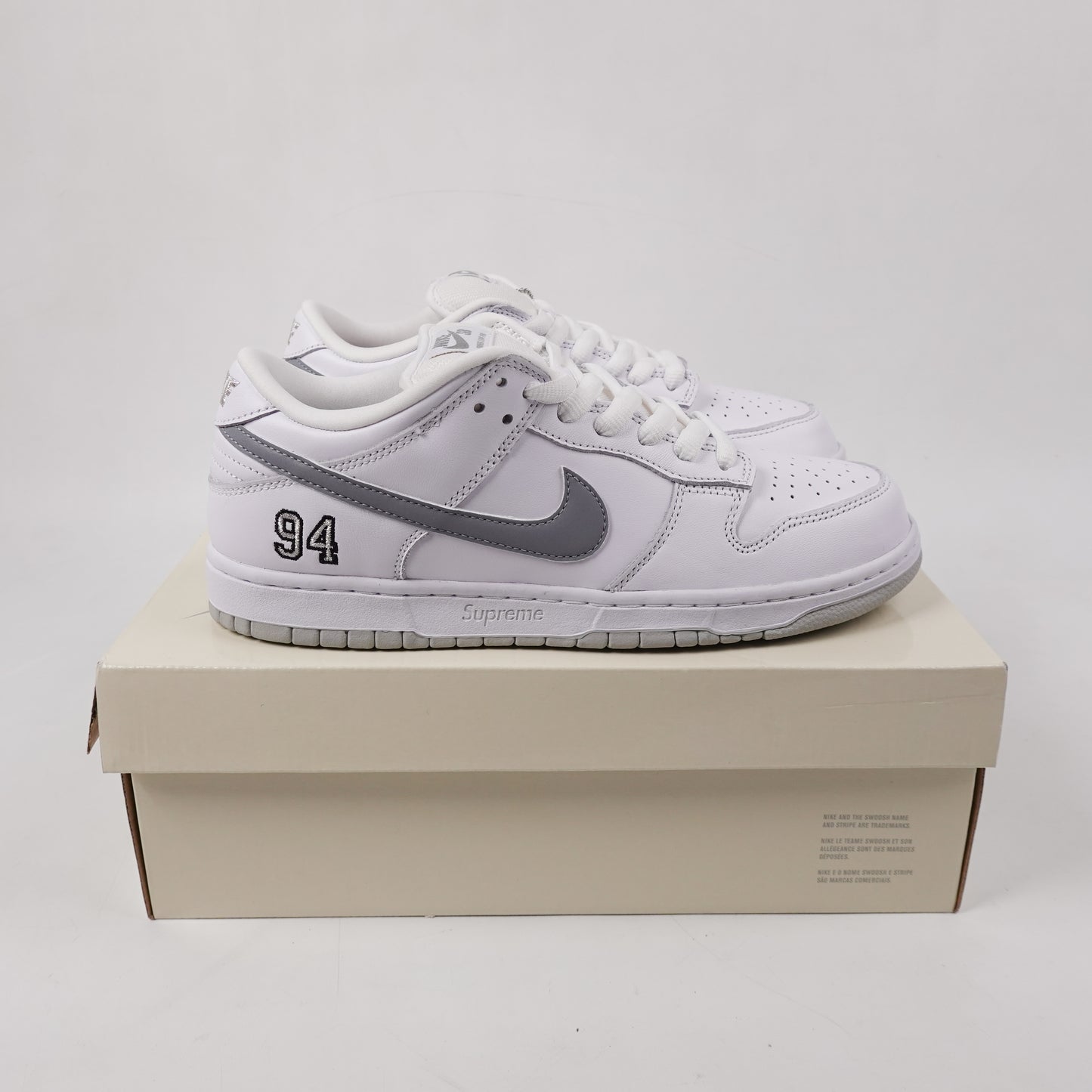 Supreme Nike SB Dunk Low White Metallic - Size 10